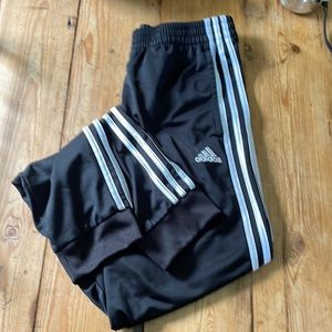 Adidas mens track pants with cuff. Size small. Black with white stripes.